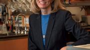 Kari Nadeau sits in her lab