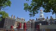 View of Dunster House, the first residence for upperclassmen to undergo full renewal, from Memorial Drive. Seven weeks after the reconstruction project began, Dunster is almost completely scaffolded, and its iron gate has been removed. 