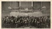 This photograph, from a scrapbook collecting items from 1929 to 1950, depicts the "Pierian Sodality Orchestra" at Boston's Symphony Hall.