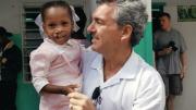 Brian Mullaney with a Haitian patient before her surgery this past February. Smile Train has provided roughly 160 surgeries in Haiti and recently launched “Cleft-free Haiti” to completely eradicate cleft there.