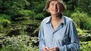 Volunteer guide Al Levin at the Lily Pond in Garden in the Woods