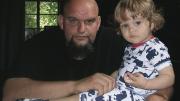 Fetterman at home with his young son, Karl