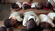 Children enjoy their naptime inside the kindergarten 1 and 2 classroom of Salomey Kortsu at Desmercy School.