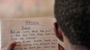 A child in teacher Anane Vera's Basic Secondary 3-level classroom at Romesco International School learns about plants in the day's lesson.