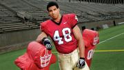 Defensive tackle Josue Ortiz with a blocking sled at Harvard Stadium
