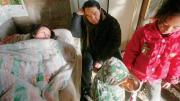 Visiting the home of a sick mother and her children