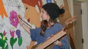 Photograph courtesy of David Fichter Student working on <i>Lawrence School Garden Mural</i>