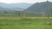 Crop fields and haystacks in Romania.