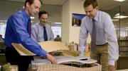 Principals Clifford Gayley, Douglas Johnston, and Rawn discuss a model in their office.