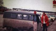 John Graham and David Roberts on the Alcan (Alaska-Canadian) Highway, en route to Mount McKinley, pose alongside the team’s VW Microbus.