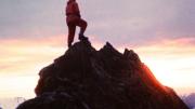 Don Jensen atop a rock tower above Camp Three, altitude 8,200’