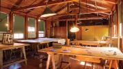 The enduring, simple beauty of Olmsted&rsquo;s landscapes is echoed in the rustic wooden interior of the restored drafting room at Fairsted.