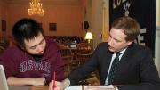 Gorick Ng &rsquo;14 worked with his coach, David Ager, when preparing to speak to the House audience in 2012.