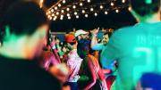 A crowd of people dancing at night at the Institute of Contemporary Art