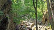 Hikers stand in Purgatory Chasm, near Worcester, Massachusetts