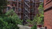 Photograph showing scaffolding for renovation of Harvard’s Adams House undergraduate residence