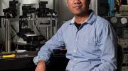 Portrait photo of Venkatesh Murthy in his laboratory