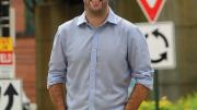 portrait photograph of Nicholas Stephanopoulos in a casual shirt and jeans
