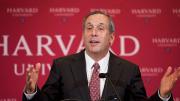 News photo of President-designate Bacow, with Harvard necktie, at his announcement news conference, February 11, 2018
