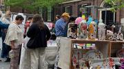People outside at art vendors' stalls at the RISD Craft fair  