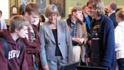 President Faust looks on as freshmen sign up for TurboVote.