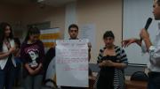 Instructor Josh Daneshforooz provides individualized feedback to a team on their final project idea.