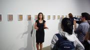Jennifer Quick, a Ph.D. candidate in the department of the history of art and architecture, compares Michael Wang's micrograph images of artificially produced stem cells to the work of pointillist painter Georges Seurat.