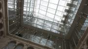 The centerpiece of the new museum is the fifth-story glass lantern that allows light to flow all the way down to the first-floor courtyard.