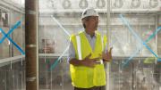 Cabot director of the Harvard Art Museums Thomas Lentz. Behind him is another example of architect Renzo Piano’s penchant for exposing a building’s systems: the exhaust fans for the atria.
