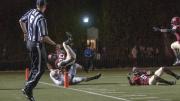 Safety Jaron Wilson (30) hurtled into the end zone after a 51-yard interception return that helped Harvard to a 21-13 lead late in the second period of the Brown game. Cornerback Brian Owusu (6), at right, cleared the way with a devastating block just in front of the goal line.
