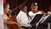 A quartet of instrumentalists and trio of singers from Conservatory Lab Charter School performed arrangements of “Amazing Grace” and “Feelin’ Good” before President Faust spoke.