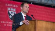 Dean James Ryan speaks to the more than 1,300 attendees at the HGSE campaign launch, held under a tent in Radcliffe Yard.