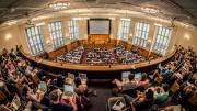 Photo of Yale students attending CS50 in the Yale Law School auditorium