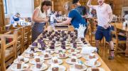 Photo of Yale CS50 students enjoying cake