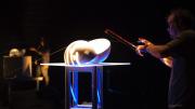 ICE percussionist Ross Karre "plays" an aircraft cable.