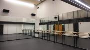 A dance studio with glass walls. 
