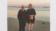 Marilyn Pappas and Jill Slosburg-Ackerman on the beach as older women.