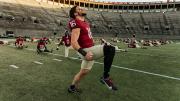 Harvard football players limbering up for season-opening game