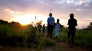 Children from New Hope orphanage in Busia, Uganda, make their nightly walk to get water for drinking and washing. They handle all the chores themselves—an important part of director Ken Mulago’s strategy for running the orphanage. “We want our children to behave as responsible adults,” he says. “We don’t want to raise them up just to think about themselves.”