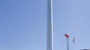 Two 10-kilowatt wind turbines generate renewable power atop the Soldiers Field parking garage.