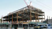 Structural steel is erected for the Law School’s Wasserstein Hall, Caspersen Student Center, and clinical-wing project on Massachusetts Avenue at Everett Street.