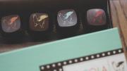 The whimsical Sôcôla logo, a winged alpaca nicknamed “Harriet,” appears in various colors on some of the truffles.