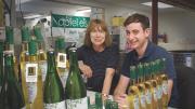 After their apple ice wine has fermented for three months, Margot and Leif Holtzman fill and seal each bottle by hand.