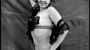 Essex Junction, Vermont, 1973. “We aren’t professional show girls, we’re prostitutes pretending to be show girls. But what else can I do? The only thing I know how to do is dance. I can’t be a teacher; I don’t have the patience. I couldn’t work as a nurse, because I get too emotionally involved. The only thing I can do is dance or be a waitress. Do you want me to be a waitress for the rest of my life?” ­  —Lena, from the book <em>Carnival Strippers</em>