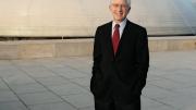 James Snyder stands in front of the exterior dome of the Israel Museum’s Shrine of the Book, which houses the Dead Sea Scrolls.