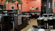 Among Vee Vee’s charms are its boldly colored walls (Benjamin Moore’s “Autumn Cover”), a signature touch for co-owner Kristen Valachovic, an interior designer before restaurant life took hold.  