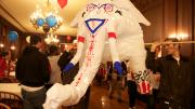 Students prepare the Eliot House elephant to appear in the 375th anniversary parade.