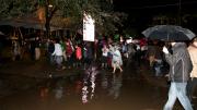 Just before the main ceremony was scheduled to begin, University Marshal Jackie O'Neill announced that a lightning storm was moving through the area, and instructed to partygoers to move indoors for safety's sake.