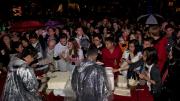 The crowds were appeased after receiving their "precious bricks" of red velvet cake.