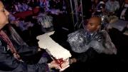 After the crowd broke into chants of "Cut the cake!" several times, it was finally served around 9 p.m.